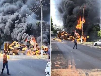 Trem com combustível colide com caminhão e pega fogo